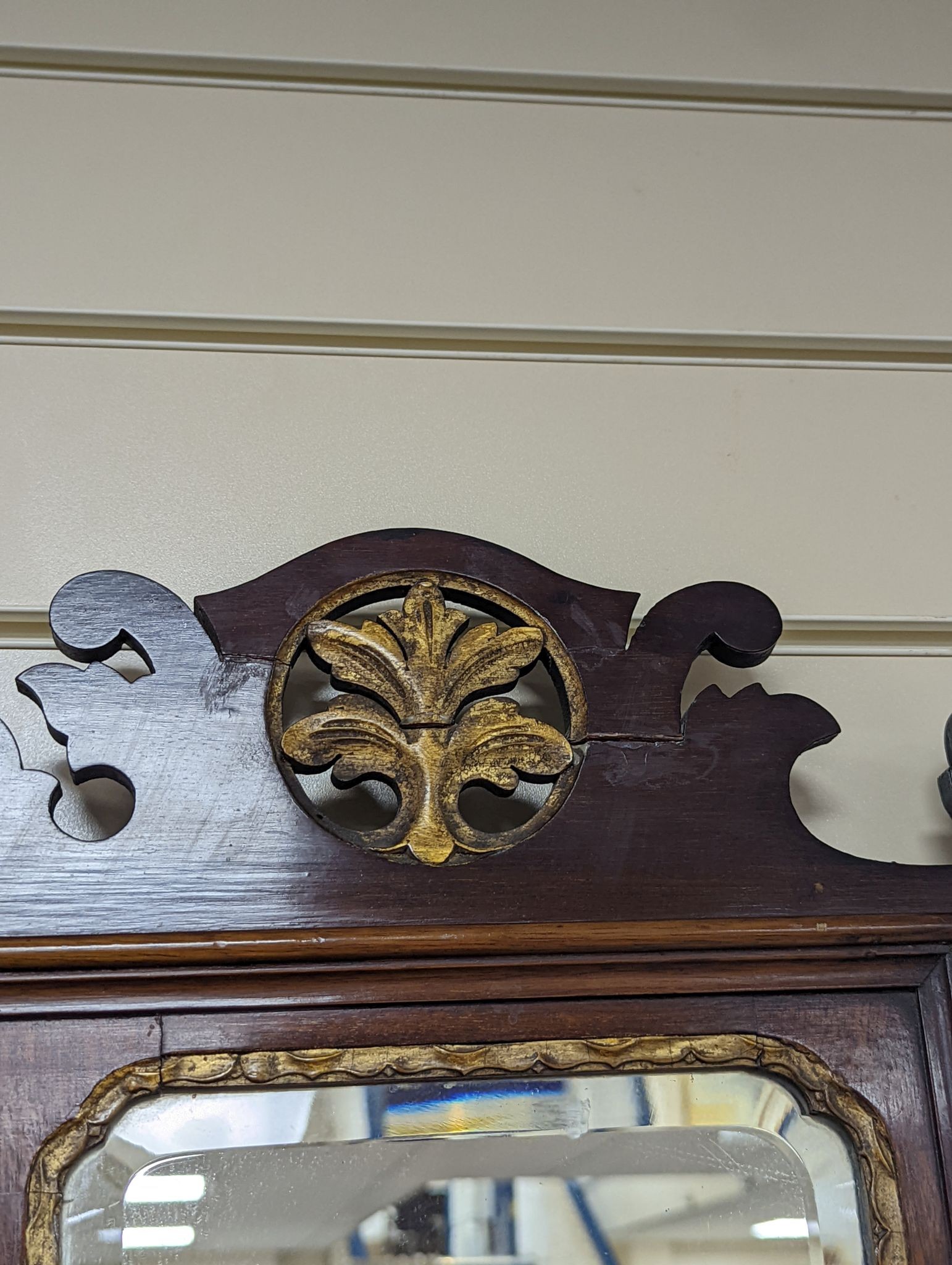 An Edwardian George III style mahogany fret cut triple plate overmantel mirror, width 116cm, height 86cm